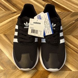 Never wear Brand new Adidas women size 7